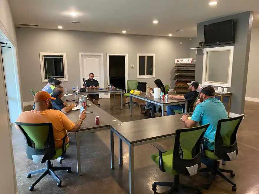 A Steele Roofing in-house training session underway in the company office